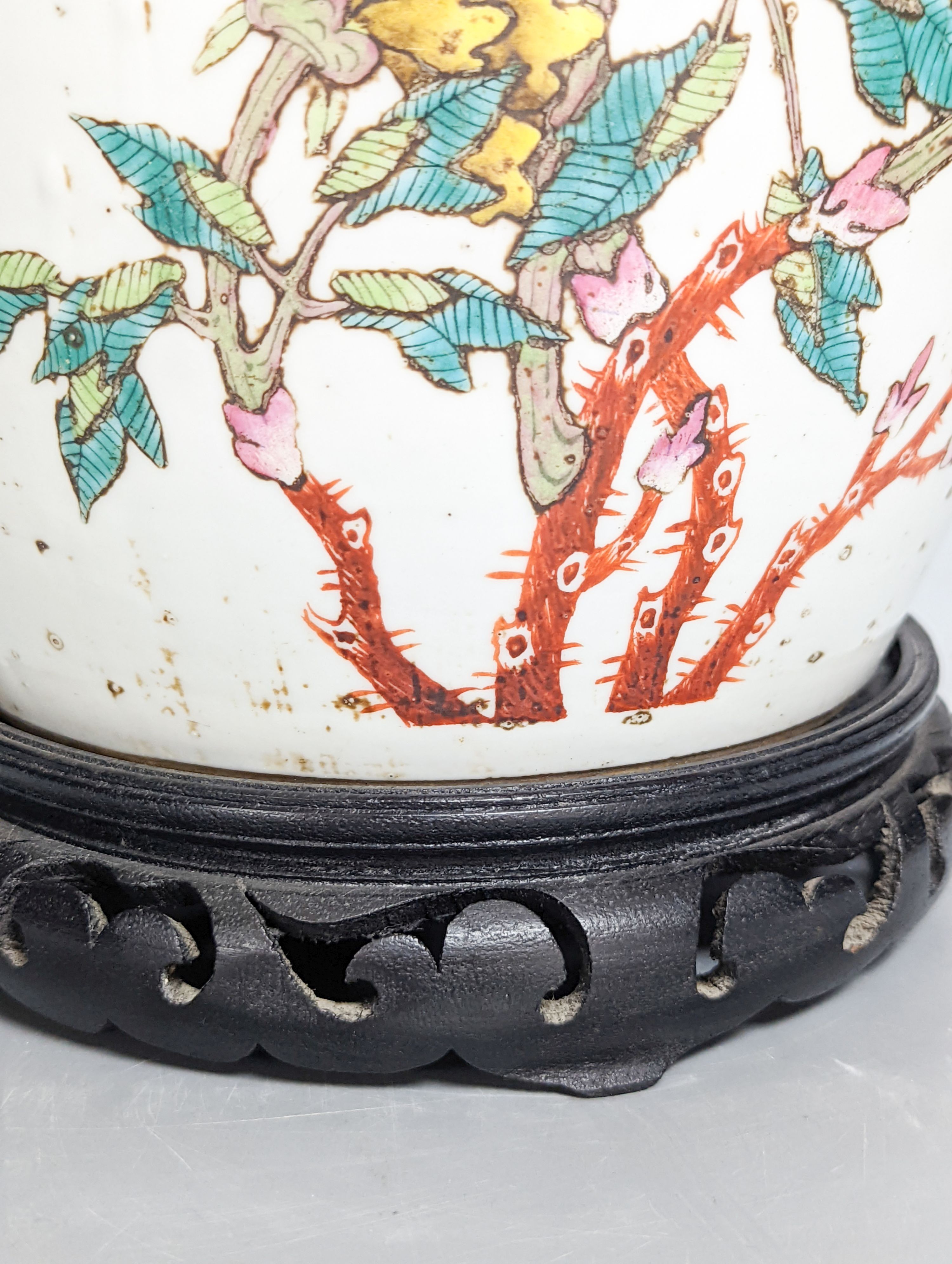 A Chinese famille rose jar now mounted as a lamp, 41 cm high to lamp fitting